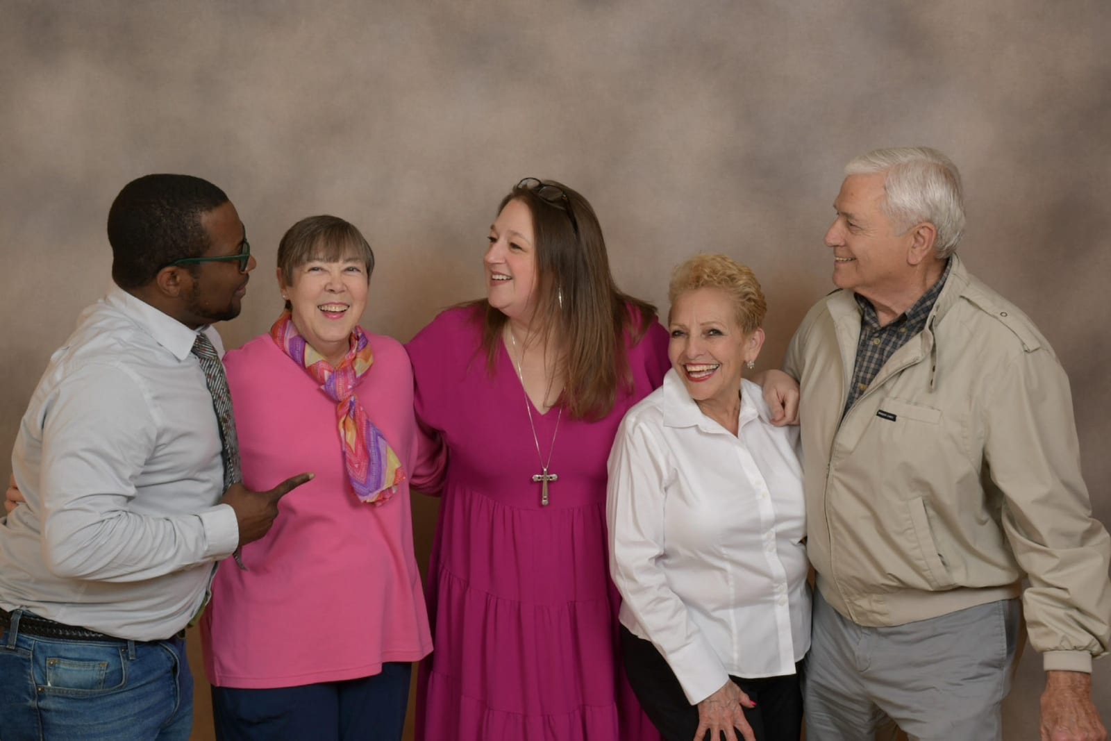 Five First Christian Church staff members laughing together