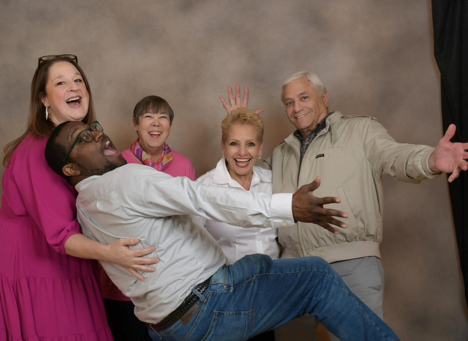 The First Christian Church staff sharing a playful moment